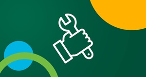 A hand holding an wrench icon